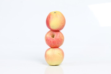 red and yellow apples fruit isolated on white background
