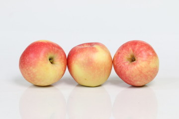 red and yellow apples fruit isolated on white background