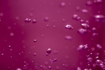 Luftblasen auf pinkem / magenta Grund