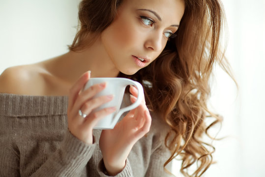 Sexy woman are enjoying the coffee