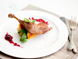 Roasted partridge, chicken thigh with salad