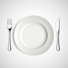 White plate, fork and knife.