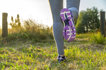 Woman running in a field