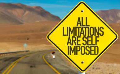 All Limitations Are Self Imposed sign on desert road