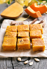 Pumpkin bars on wooden table