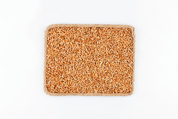 Frame made of the rope with wheat  grain on a white background
