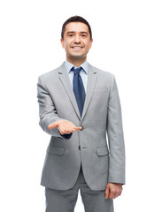 happy smiling businessman in suit