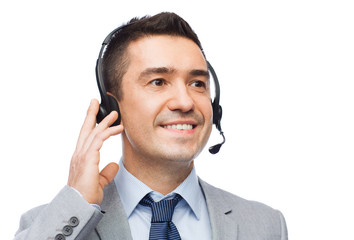 smiling businessman in headset