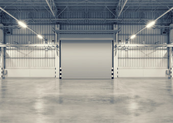 Roller door or roller shutter inside factory, warehouse or industrial building. Modern interior design with polished concrete floor and empty space for product display or industry background.