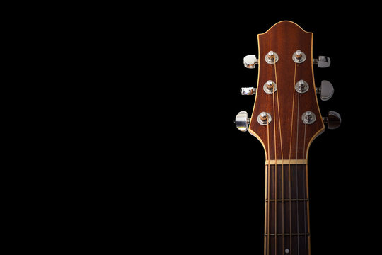 Guitar head stock on black background