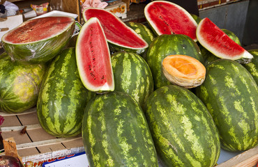 Croatia, open air stall displays on sell ripe watermelons