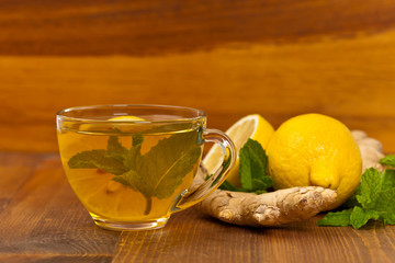 Ginger tea. Ginger, lemon, mint leaves. Selective focus.