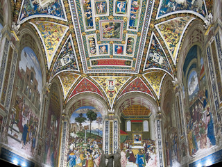 Fototapeta na wymiar Piccolomini Library with frescoes inside Duomo di Siena or Siena Cathedral in Italy