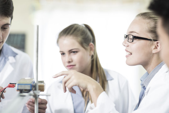 Students in physics class working together