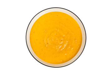 Vegetable Pumpkin Soup isolated on white.