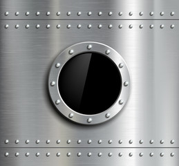 Round metal window with rivets.