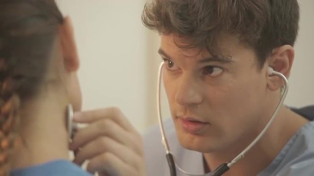 Doctor cheking with his stethoscope