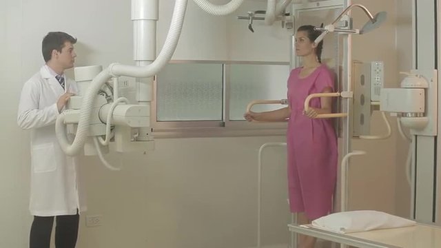 Woman examing her chest
