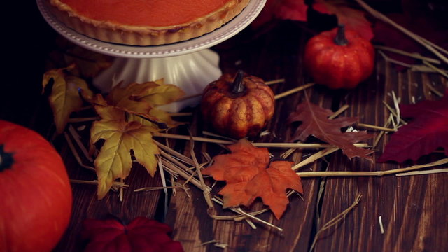 Homemade Pumpkin Pie with Autumn Decoration