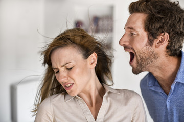 Naklejka premium Angry man. He yells at his wife