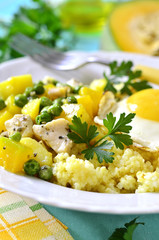 Healthy breakfast - couscous,vegetable ragout with chicken and f