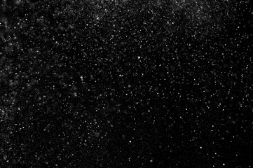 abstract splashes of water on a black background. abstract spray of water. abstract rain. shower...
