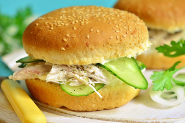 Healthy burger with cream cheese,boiled chicken and cucumber sli