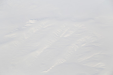 snowy land. view from the airplane