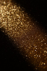 Obraz premium glitter vintage lights background. gold, silver, and black. de-focused. 
