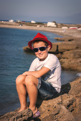the boy in a red hat