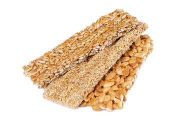 Honey bars with peanuts, sesame seeds and sunflower seeds