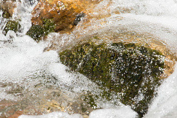 Stones in the water in a river