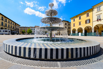 fountain multi-tiered in the city square of Colle di Val d'Elsa
