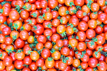 Red ripe tomatoes background