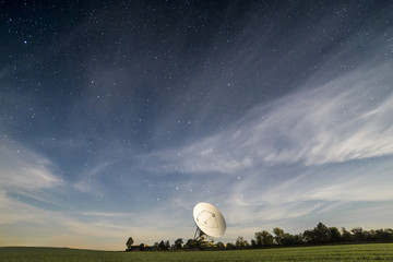 Big scientific Observatory antenna in starry night.   - obrazy, fototapety, plakaty