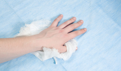 bandaged hand