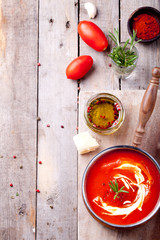 Tomato, red pepper soup, sauce with rosemary