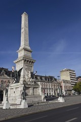 Restauradores memorial column in Lisbon, in a sunny day