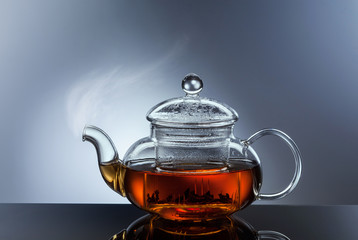 glass teapot cup with hot tea