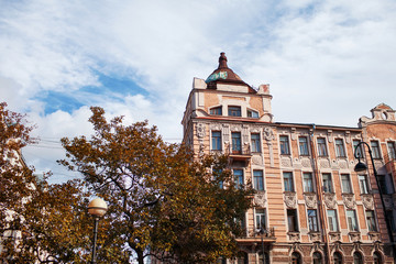 facade of the old house and autumn trees St. Petersburg