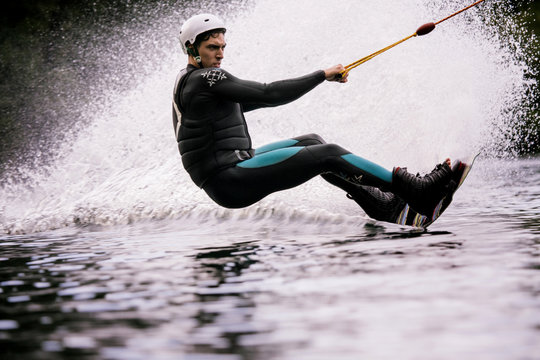 Young man wakeboarding