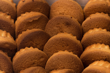 Muffins stacked in a white box
