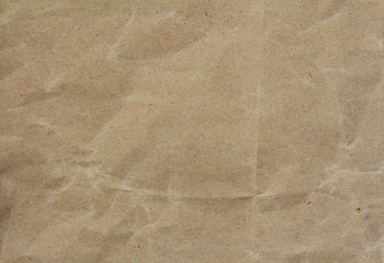 Crumpled paper background vignette