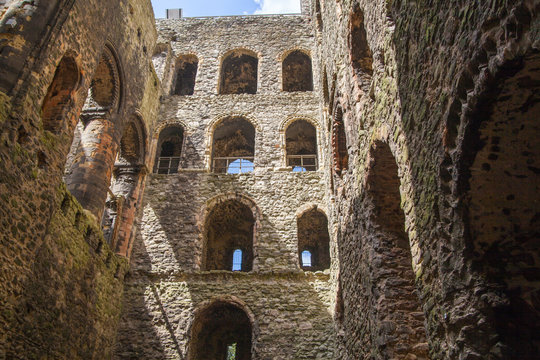 ROCHESTER, UK - MAY 16, 2015: Rochester Castle 12th-century. Inside view of castle's ruined palace walls and fortifications