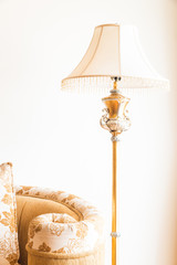 Pillow on sofa with light lamp