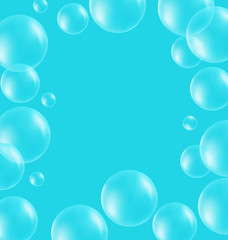 Transparent soap bubbles like frame on blue background