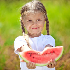 Happy kid with watermelon 