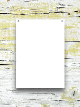 Single empty frame on weathered wooden background with nails
