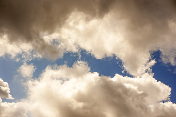 Grey clouds and blue sky
