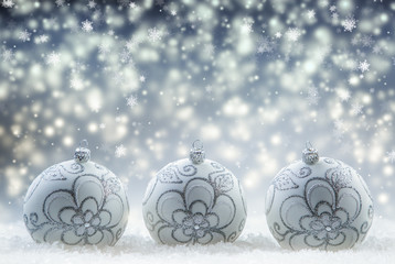 Christmas balls. Luxury Christmas ball with ornaments in Christmas Snowy Landscape. Christmas time.